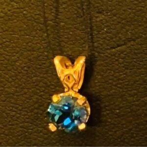 Elegant Blue Topaz and Gold Pendant Necklace